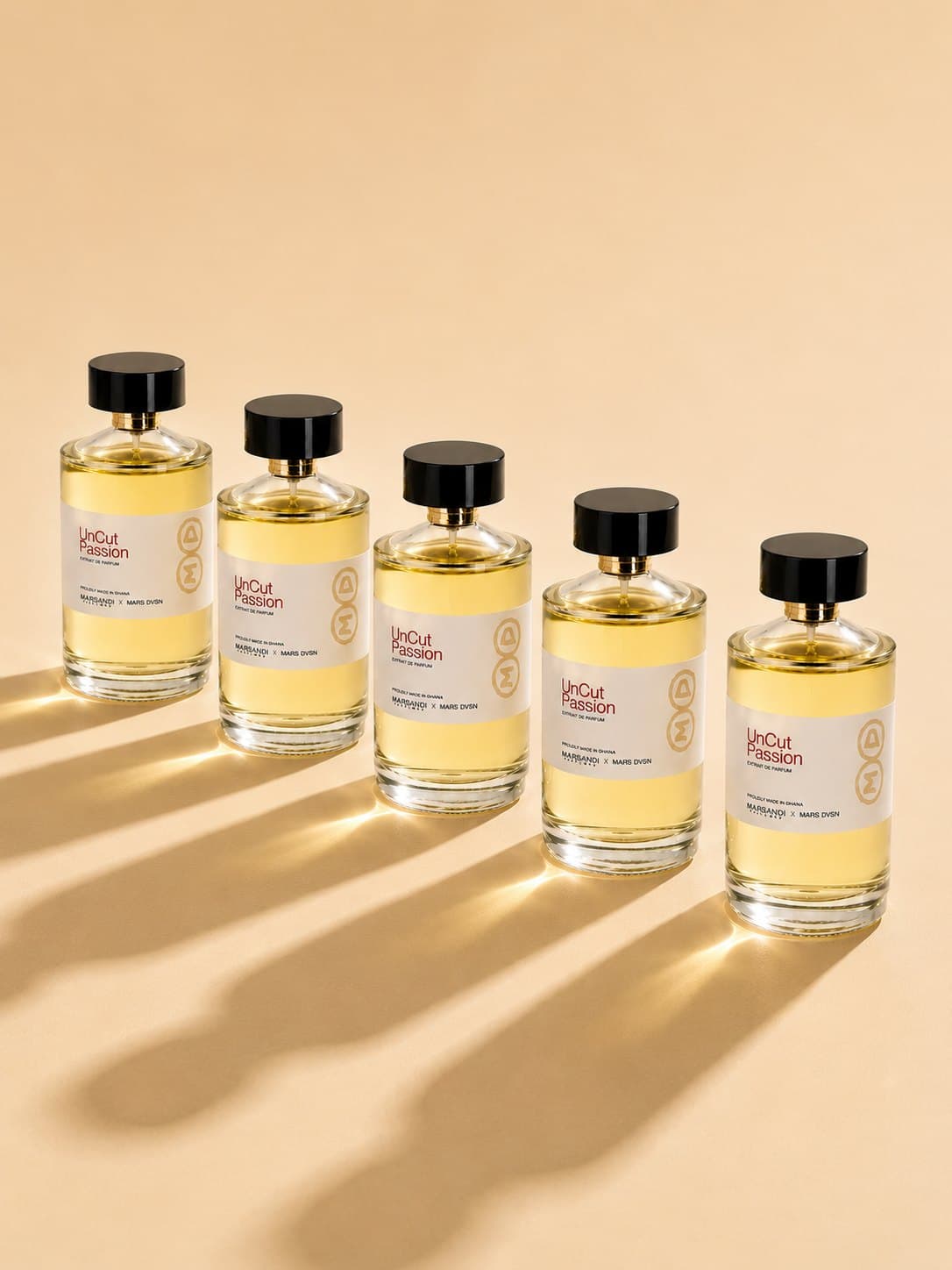 Five bottles of UnCut Passion casting long shadows